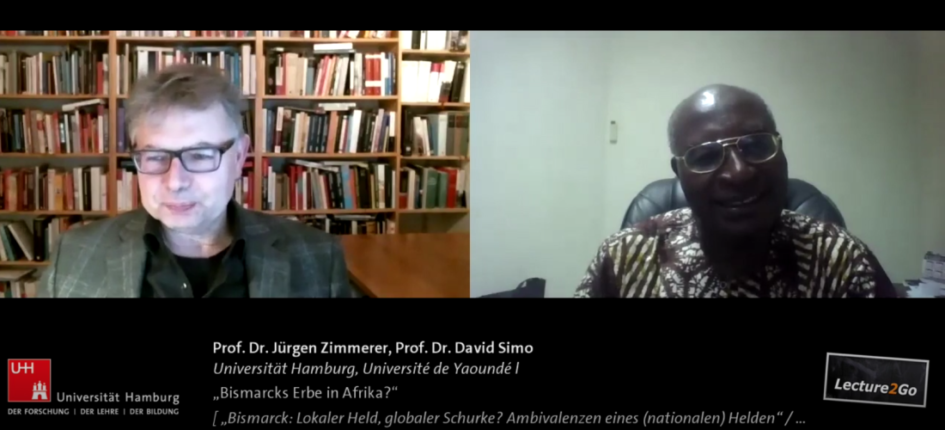 Screenshot: Prof. Dr. Jürgen Zimmerer im Gespräch mit Prof. Dr. David Simo in der Reihe 'Bismarck Global'